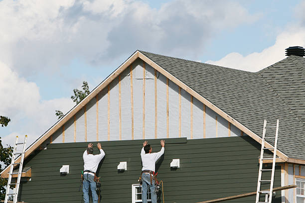 Professional Siding Installation technician working in Rogers, OH